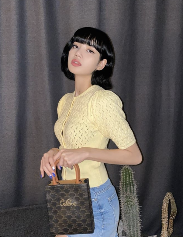 Lisa的復古瀏海短髮,加一點bob的造型,令髮型增添不少女人味。 Lisa的復古瀏海短髮,加一點bob的造型,令髮型增添不少女人味。