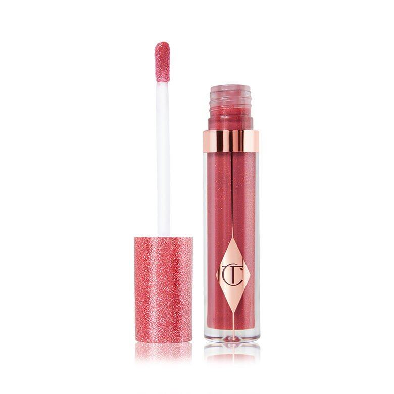 JEWEL LIPS鑽閃唇蜜為雙唇塗上一層散發閃爍微光的色彩,打造出具備鏡面感 JEWEL LIPS鑽閃唇蜜為雙唇塗上一層散發閃爍微光的色彩,打造出具備鏡面感