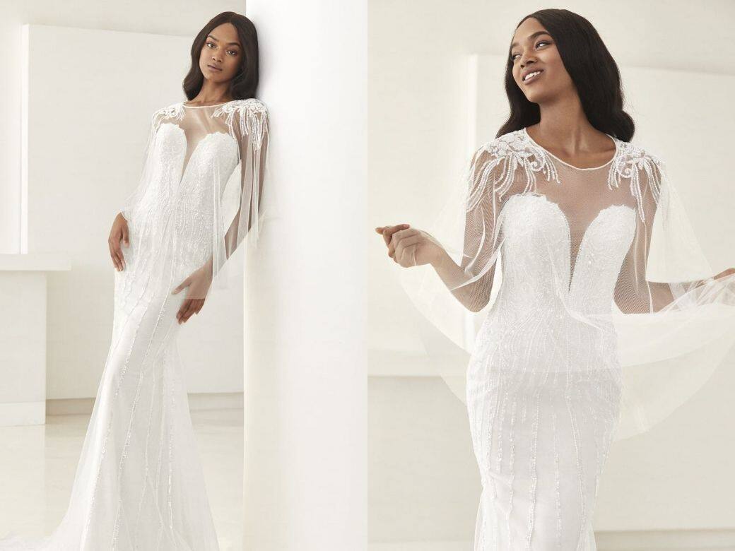 Pronovias這款中長度披肩大約到盆骨位置,以通透薄紗和sweetheart領口的設計加上膊 Pronovias這款中長度披肩大約到盆骨位置,以通透薄紗和sweetheart領口的設計加上膊
