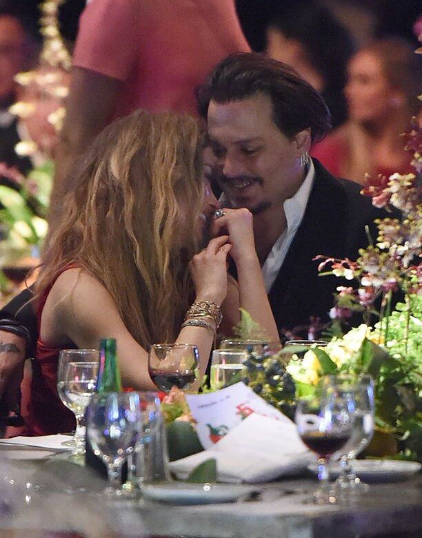 婚後Johnny 與 Amber雖然曾經出現過小風波或爭執 婚後Johnny 與 Amber雖然曾經出現過小風波或爭執
