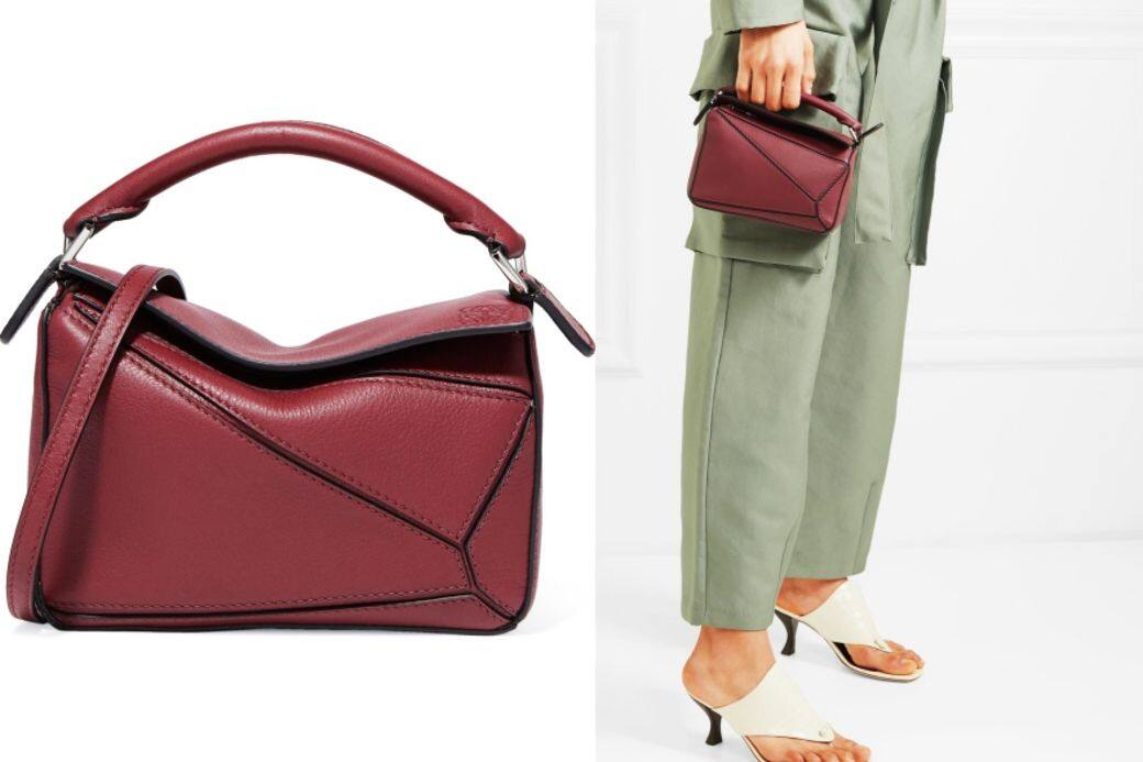 酒紅色皮革手挽袋($14,250 Loewe)本身有點陽剛味的袋型,縮小成迷你手袋卻出 酒紅色皮革手挽袋($14,250 Loewe)本身有點陽剛味的袋型,縮小成迷你手袋卻出