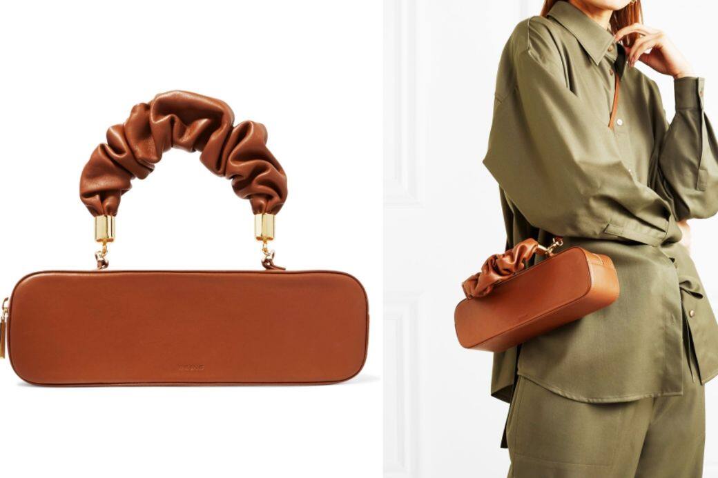 啡色皮革手挽袋($3,189 The Sant,available at Net-a-Porter.com)簡潔的線條和縐紋手挽形成有 啡色皮革手挽袋($3,189 The Sant,available at Net-a-Porter.com)簡潔的線條和縐紋手挽形成有