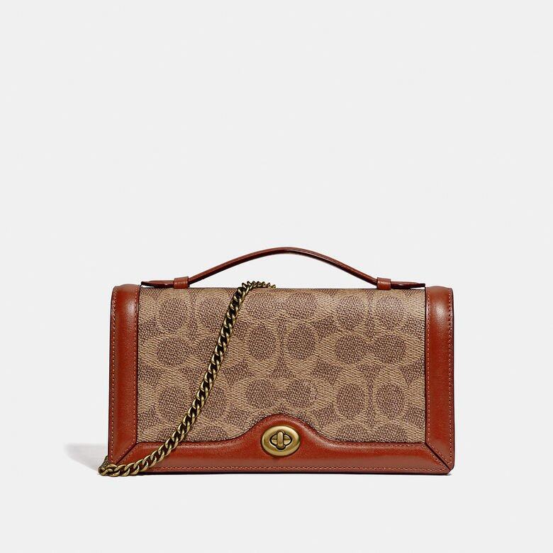 創立於1941年的Coach,78年來一直為不同年代的女性提供無數簡約時尚的優 創立於1941年的Coach,78年來一直為不同年代的女性提供無數簡約時尚的優