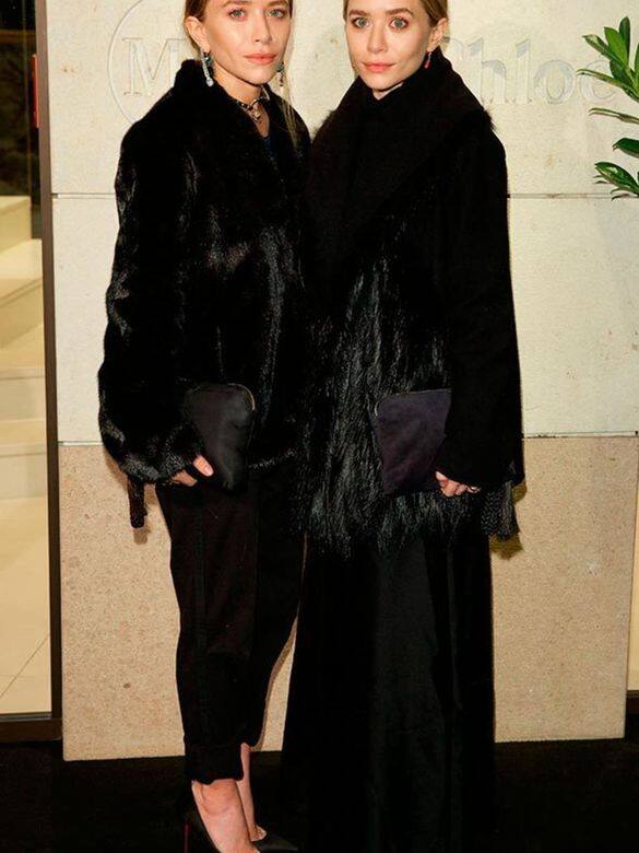 黑色穿搭當然少不了皮草！Mary-Kate和Ashley Olsen參加了在慕尼黑舉辦的Marion Heinrich商店