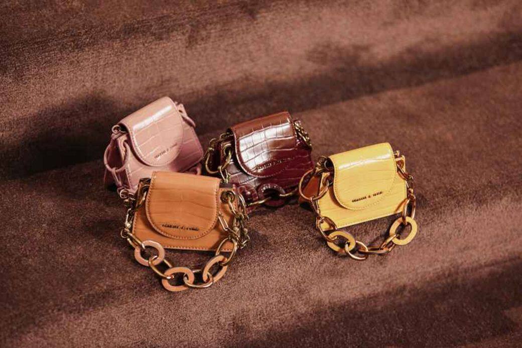 Charles & Keith 2019秋冬系列主打色調中性、設計簡約的單品,除了手袋外,皮革大腿靴 Charles & Keith 2019秋冬系列主打色調中性、設計簡約的單品,除了手袋外,皮革大腿靴