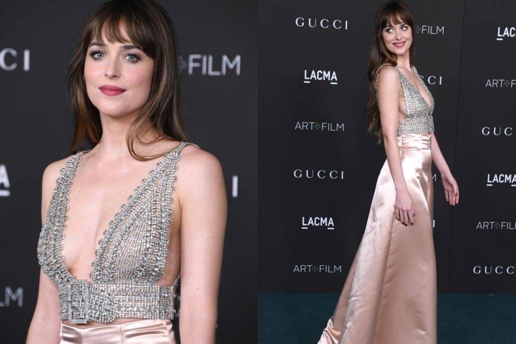 Dakota Johnson近日以一身華麗又吸睛的Gucci造型出席LACMA Art+Film Gala,穿著一件閃鑽鏤空 Dakota Johnson近日以一身華麗又吸睛的Gucci造型出席LACMA Art+Film Gala,穿著一件閃鑽鏤空