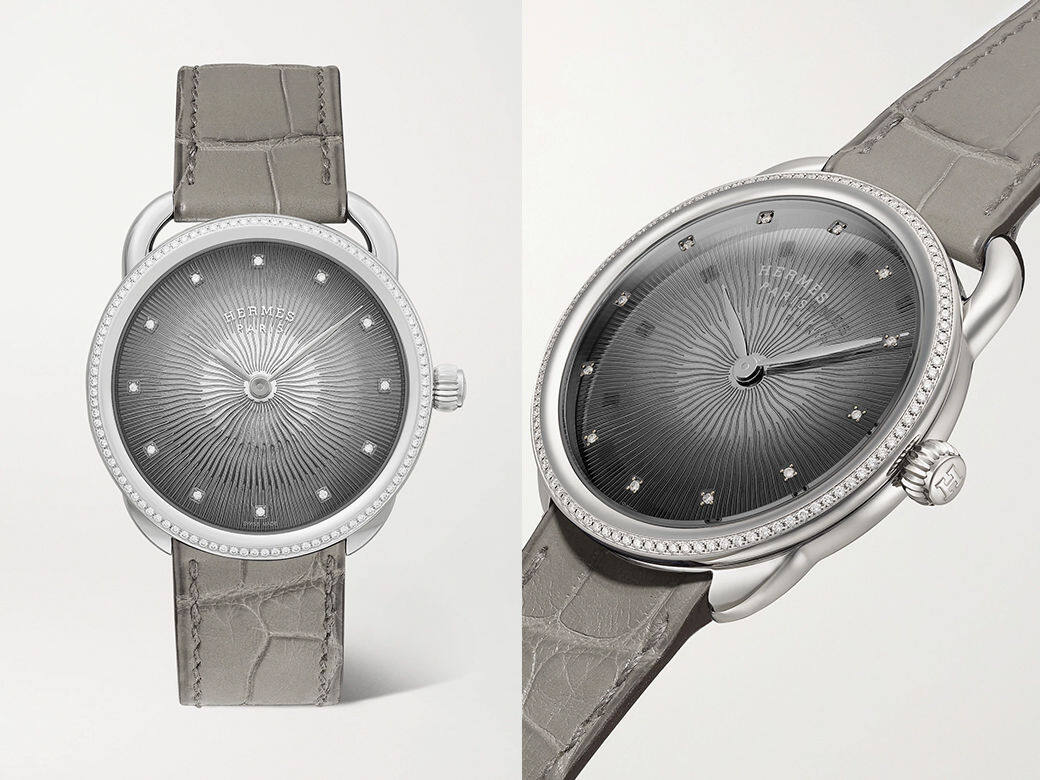 此款Hermès Arceau Soleil手錶，重點設計在於錶盤上的幾何射線圖案，立體設計相當