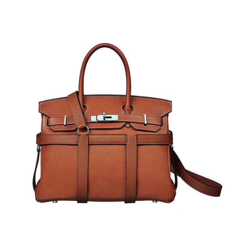 能把Hermès Birkin手袋繫於其中的Swift小牛皮馬韁,配以鈕扣飾釘,設計靈感源自 能把Hermès Birkin手袋繫於其中的Swift小牛皮馬韁,配以鈕扣飾釘,設計靈感源自