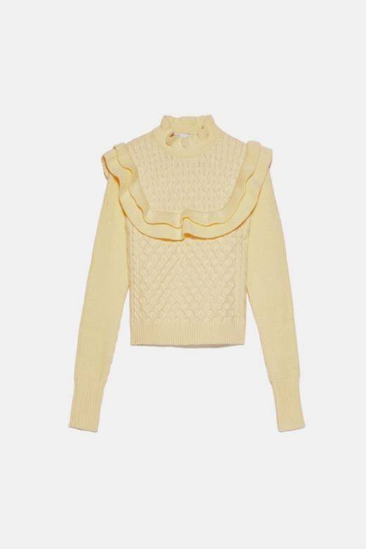 Zara這款荷葉邊麻花冷衫，立體的荷葉邊與充滿質感的織紋，營造出貴價冷