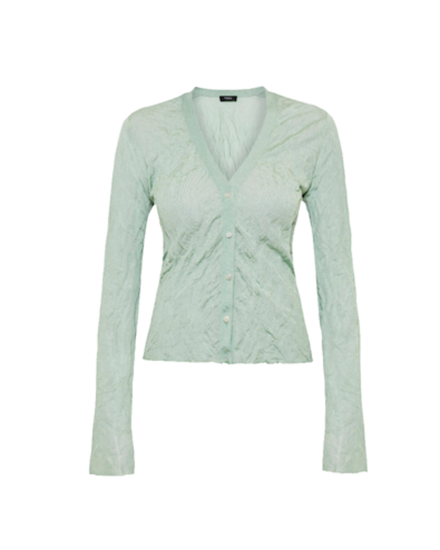 湖水綠色針織外套是新系列的重點設計。