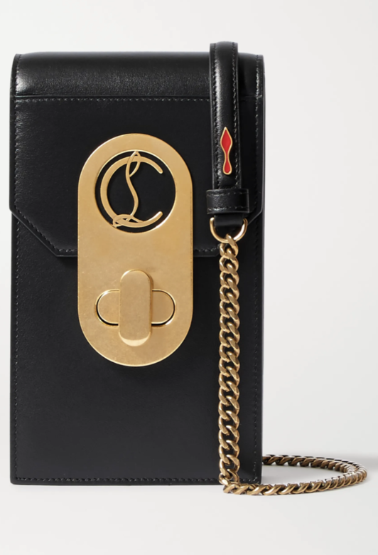 Christian Louboutin這款手機袋除了手機,你也可以在裏面裝口紅和幾張信用卡,小袋內 Christian Louboutin這款手機袋除了手機,你也可以在裏面裝口紅和幾張信用卡,小袋內