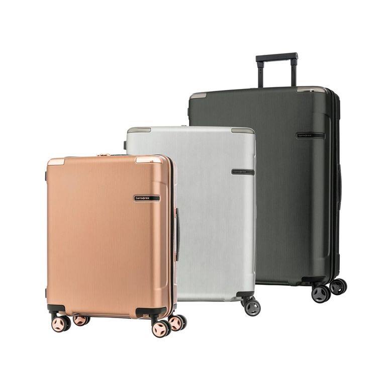 Samsonite EVOA系列硬殼行李箱Samsonite全新EVOA系列共有黑、銀、玫瑰金三款顏色，髹刷紋理