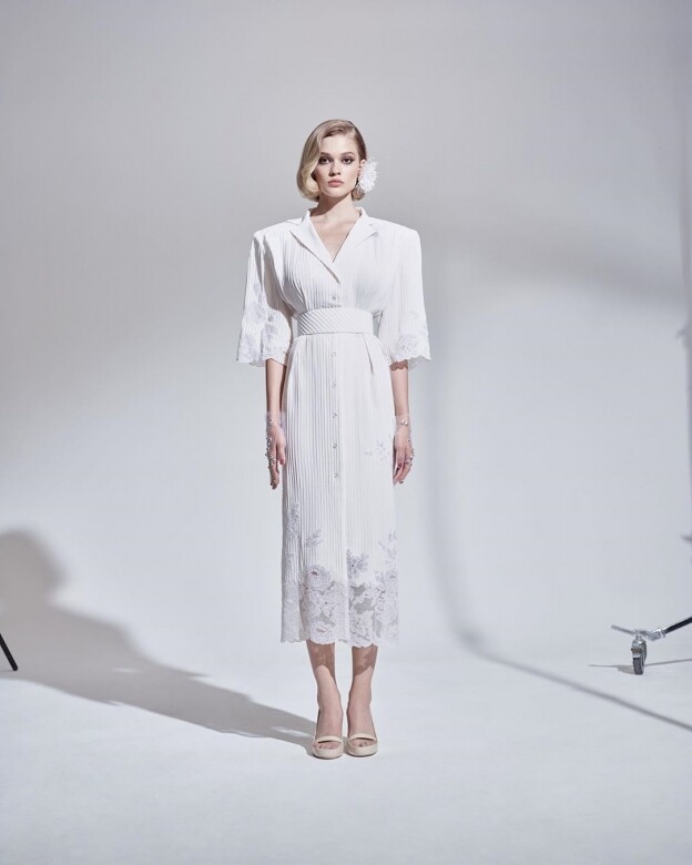 Natalia Vodianova的婚紗選擇了俄羅斯設計師Ulyana Sergeenko，作為Louis Vuitton、Stella McCartney、DKNY等各大時尚品牌