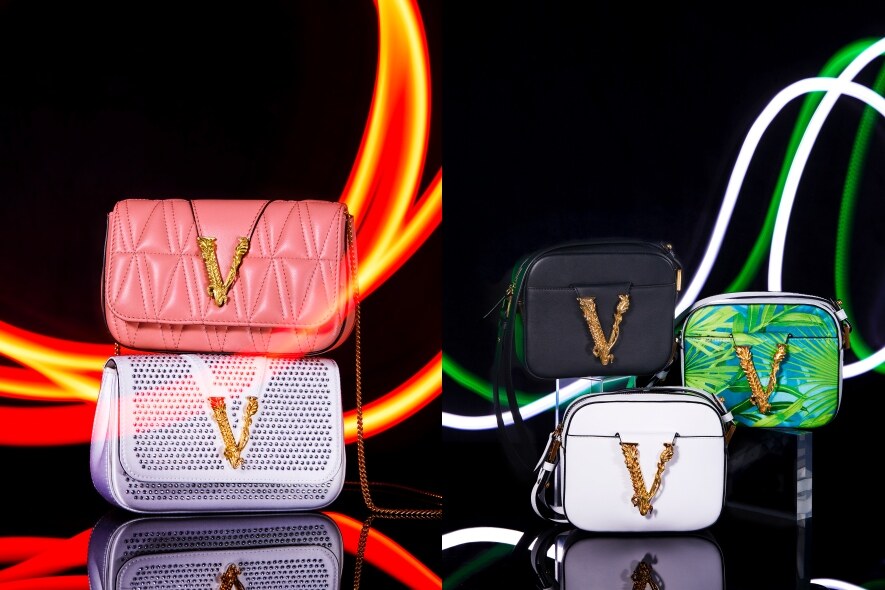 (左)Virtus粉紅色絎縫皮革晚裝袋 $7,300Virtus綴閃石白色皮革晚裝袋 $8,000（Both from Versace